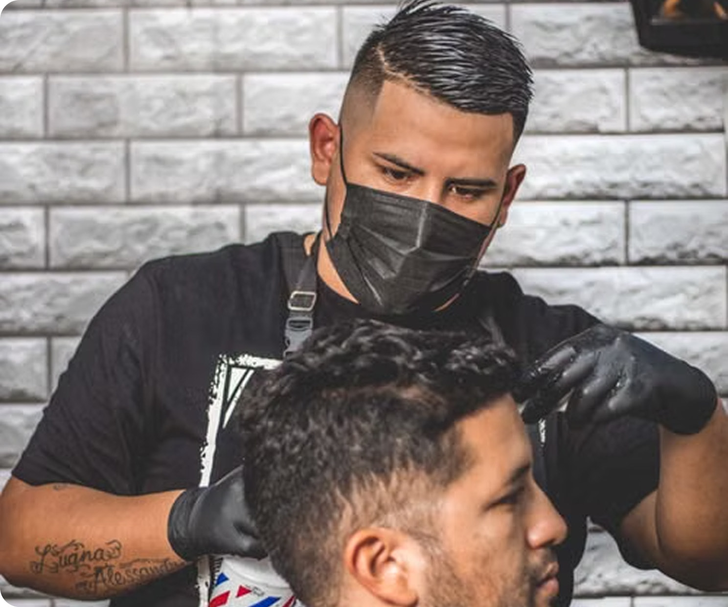 A barber at work in his shop