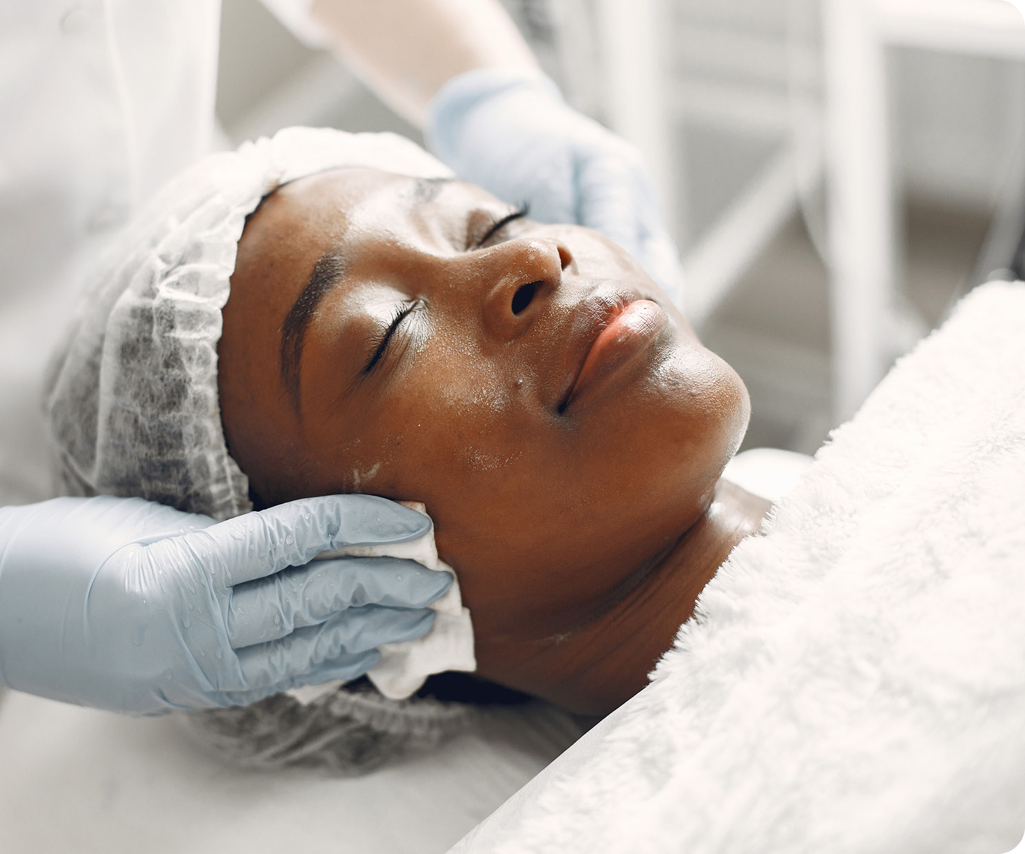 A client having a facial treatment
