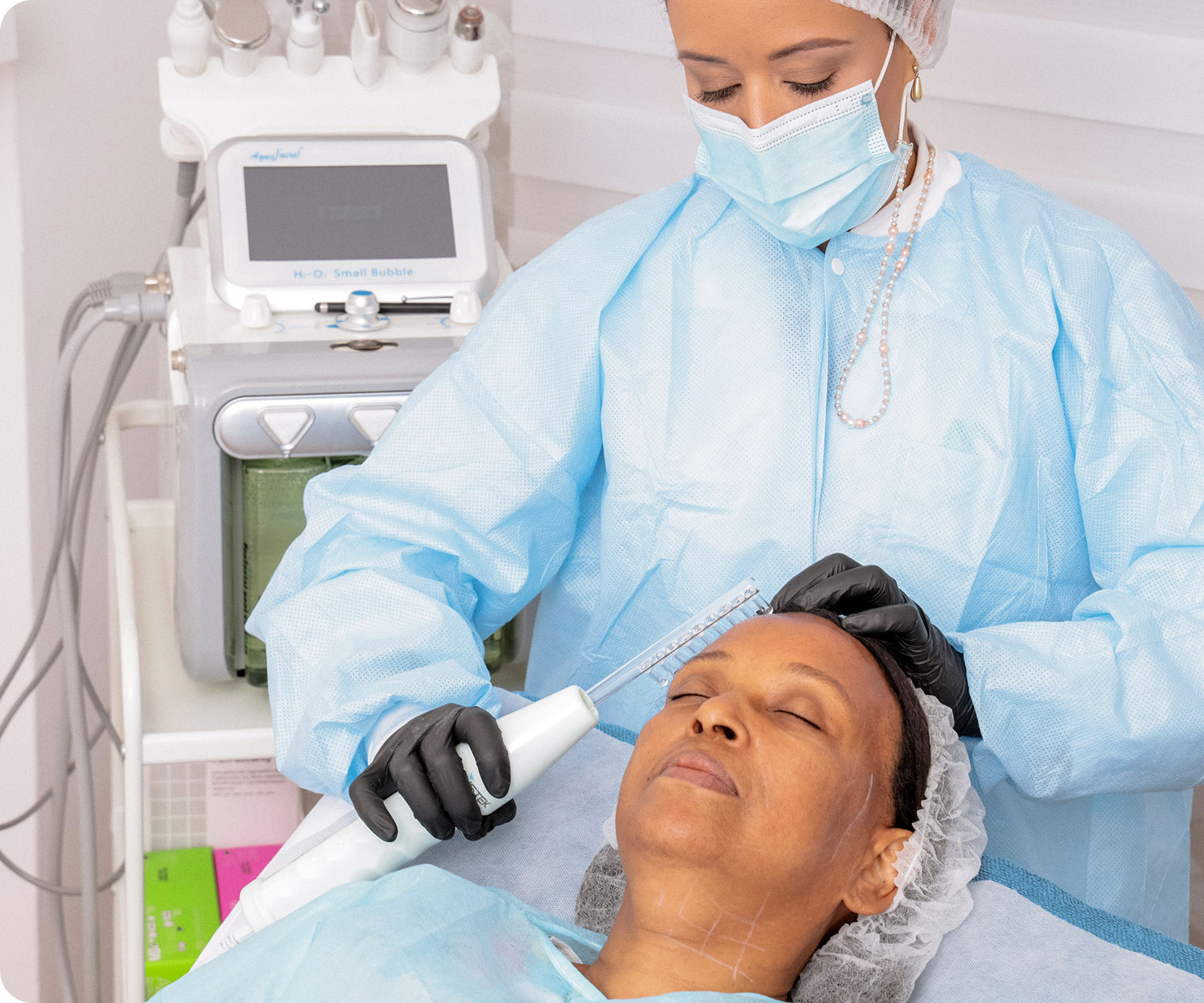 An esthetician working through a treatment session