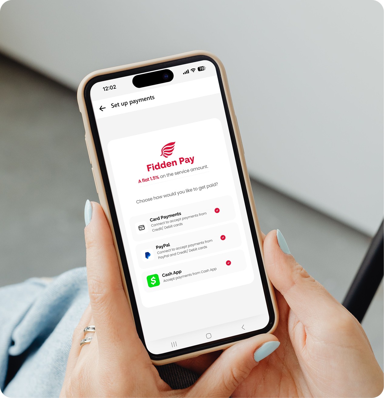 The Fidden Pay set-up screen open on a phone, held in both hands
